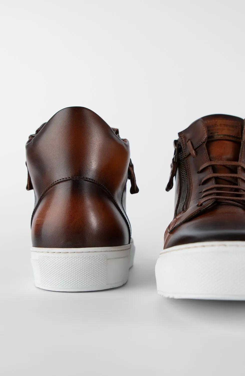 SOHO cocoa-brown patina high sneakers.
