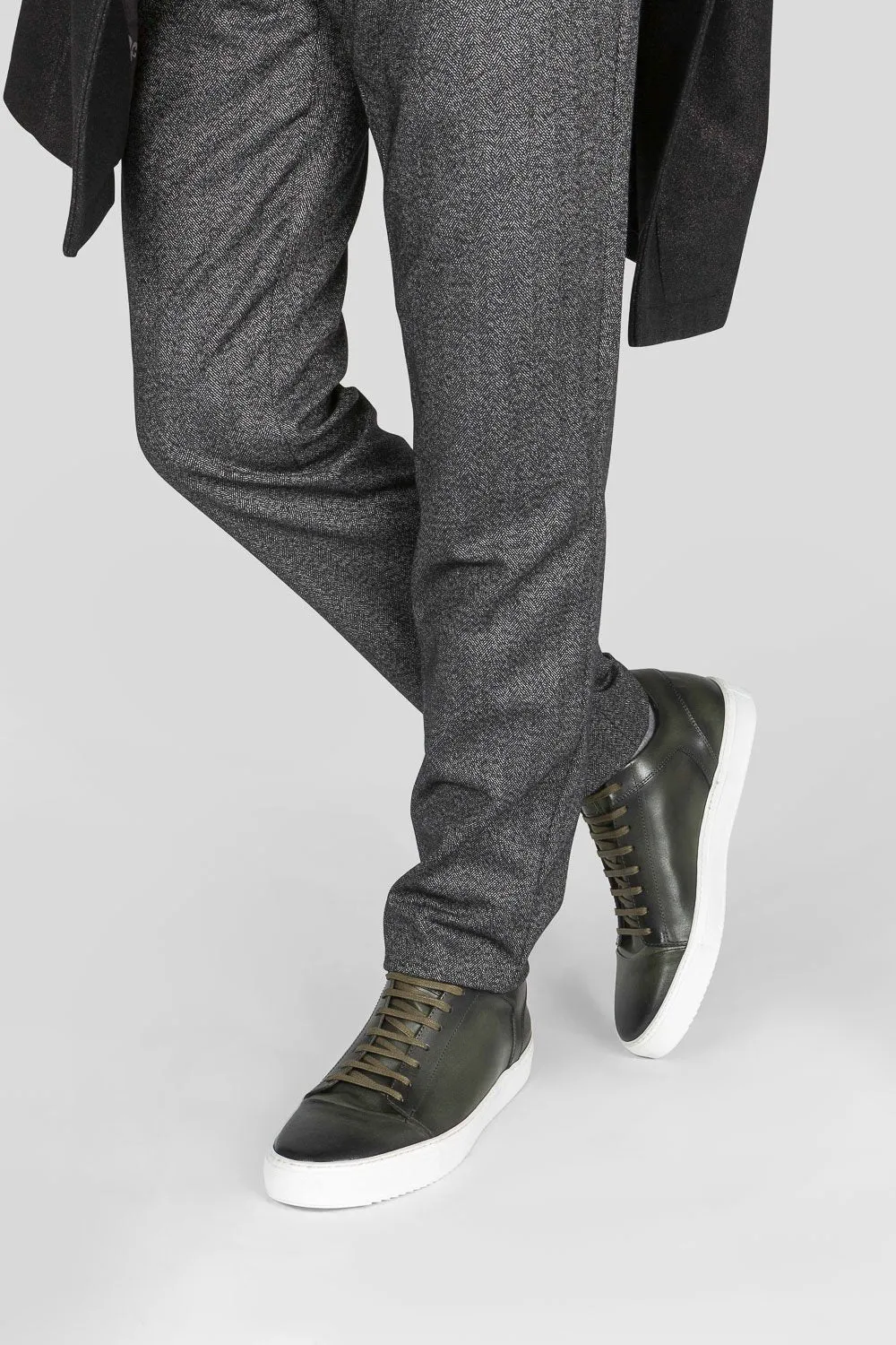 SOHO forest-green cap toe patina sneakers.