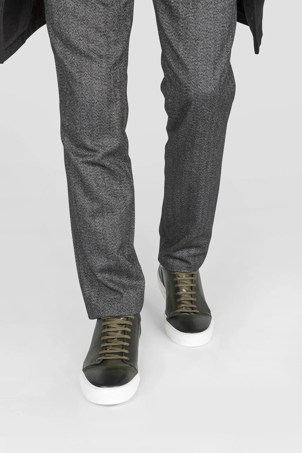 SOHO forest-green cap toe patina sneakers.